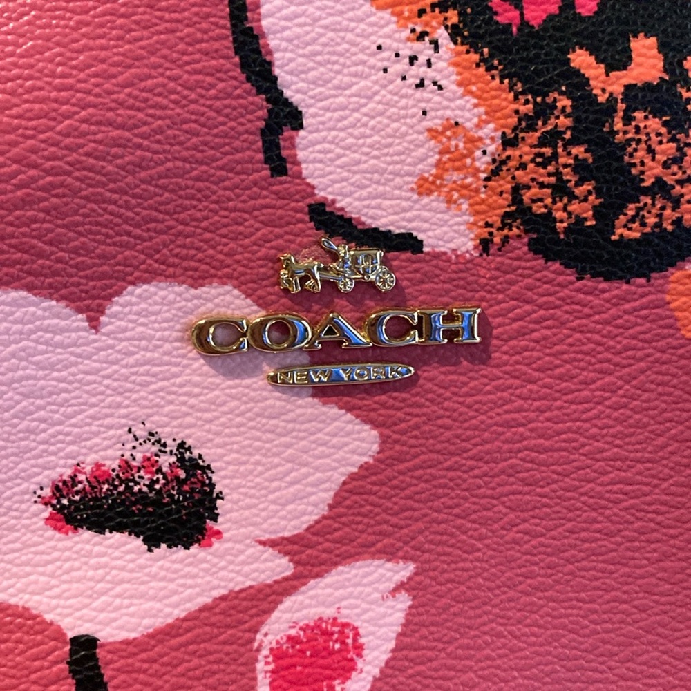 Coach pink floral purse very good condition, slightly used